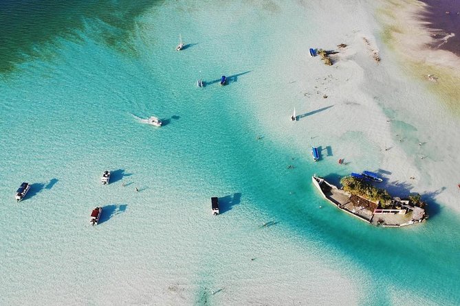 1 Day Tour to Bacalar, Cenotes and 7 color Lagoon with lunch from Cancun - Pontoon Ride to the Lagoon of Seven Colors and Pirates Channel