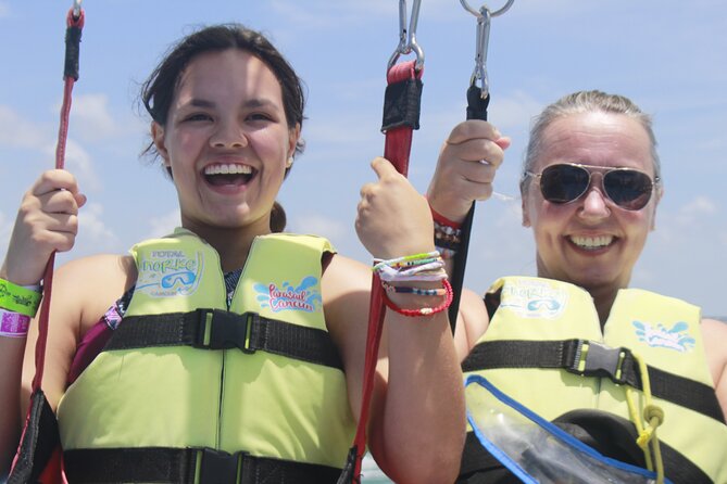 2 in 1 Parasailing and Jet Sky Tour in Cancun - The parasailing ride: 80–90 meters up for a short, intense postcard moment