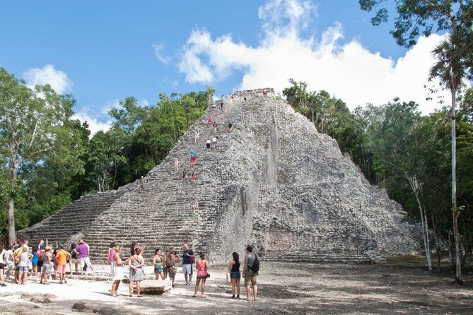5x1 Tour: Tulum Coba Cenote Mayan Village and Playa del Carmen - Stop 1: Tulum ruins with guided history and walk-around time
