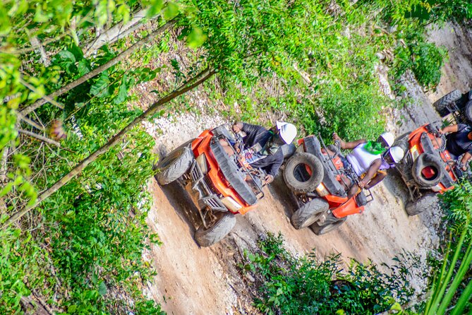 Action-packed Cancun ATV tour, Ziplines, Cenote, Lunch and More - Cenote Swim and Exploration: Cool water is the best payoff