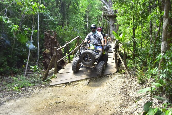 Adrenaline Tour with ATV, Zipline, and Cenote from Cancun - Zipline circuit above the trees: thrilling, but not extreme