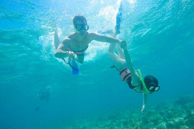 Afternoon Half-Day Catmaran Sailing and Snorkel Adventure - Snorkeling reality near Isla Mujeres: gear, currents, and who can go