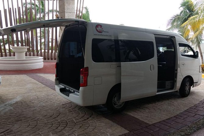 Airport Transfers to Puerto Morelos - Private van (ROUND TRIP) FLAT RATE - Meeting your driver at Cancun: banner signs and instant text updates