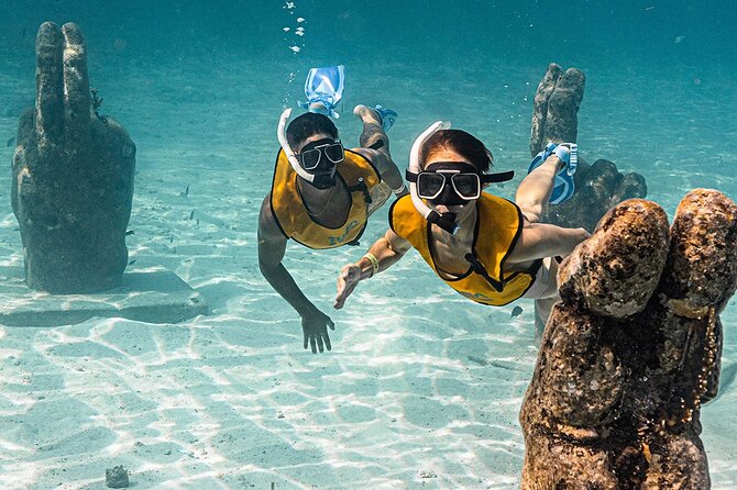All-Inclusive Isla Mujeres Catamaran with Free Transportation - Arrecife El Meco snorkeling: gear, guidance, and what to expect