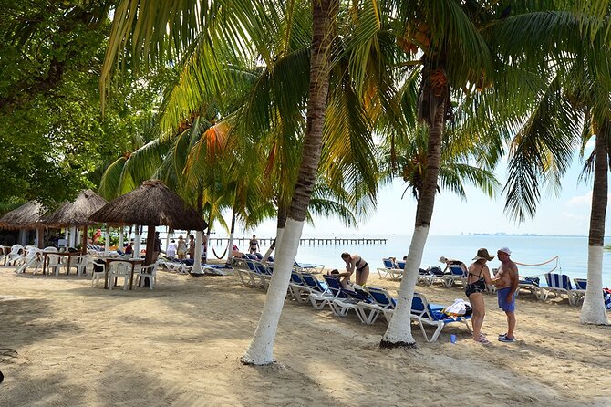 All-Inclusive Isla Mujeres Catamaran with Free Transportation - Isla Mujeres downtown free time: tequila tasting and optional golf cart plans