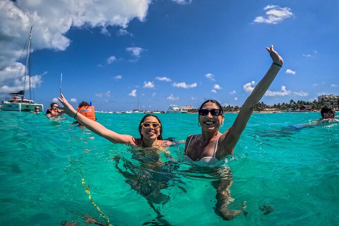 All-Inclusive Isla Mujeres Catamaran with Free Transportation - Return to Cancun at sunset: open bar on the deck