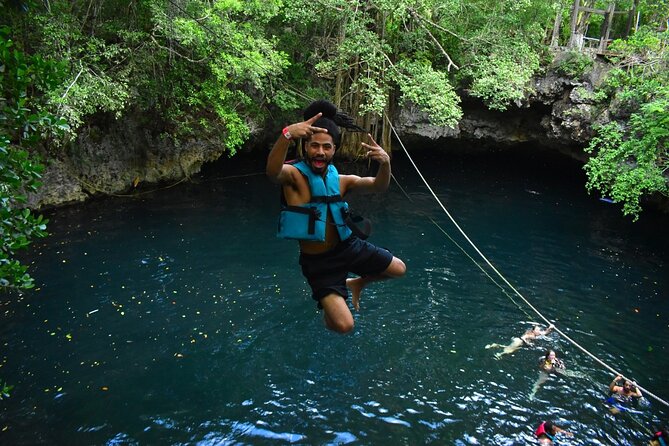 Amazing ATV Tour, Ziplines and Cenote Swim with Lunch and round trip included - Zip Lines Over the Treetops: Safety Gear Plus a No-Phone Trade-Off