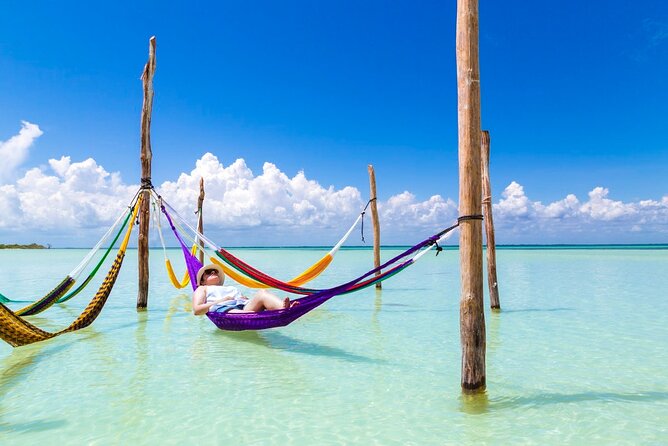 Amazing HOLBOX Full day tour and Cenote swim experience from Cancun! - Cenote Yalahau swim: calm water, life jacket, and boat drinks