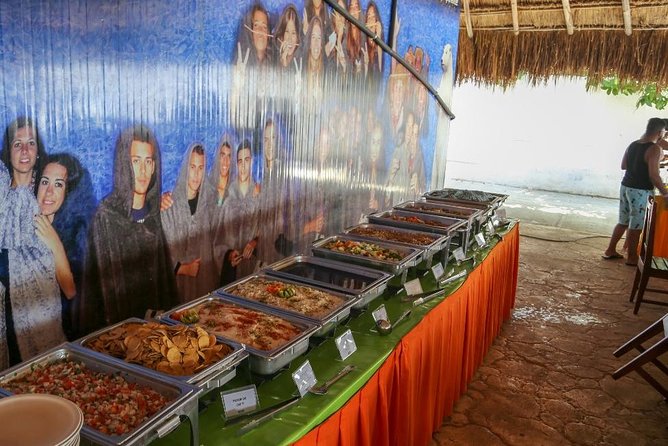 Amazing tour to the beauty Isla Mujeres with Snorkel and open bar - Isla Mujeres downtown and optional add-ons like golf carts