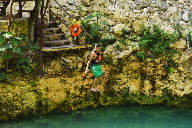 ATV's (shared), Ziplines & Cenote! Half-Day with Transportation from Cancun - Stop 2: Zip-lines where staff help you get off the platform