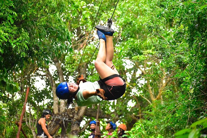 ATV, Ziplines, Tarzan Jump, Lunch and Transportation Day Tour - Jungle ziplines: harness up, then expect a kid-friendly vibe