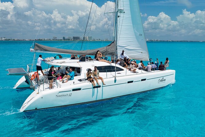 Cancun Catamaran: Isla Mujeres, Snorkeling, Drinks & Buffet Lunch - Boarding the Catamaran: Comfort vs. Capacity
