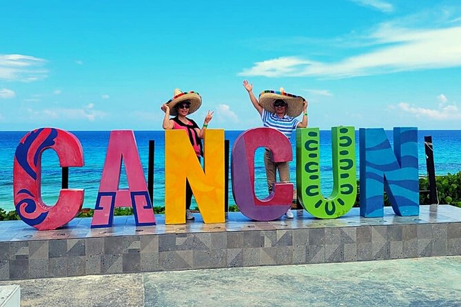 Cancun City Sightseeing and Shopping Tour on a Double Decker bus - Plaza La Fiesta Tequila Tasting and Candy Shopping
