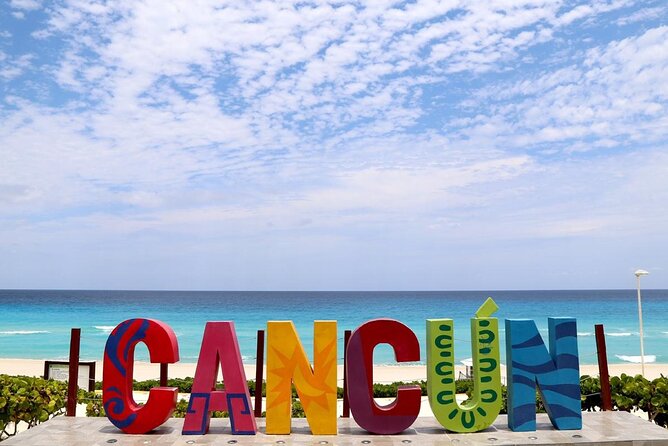Cancun City Tour + El Meco Ruins Round Transportation - Stop 4: Playa Delfines and the Cancun letters photo moment