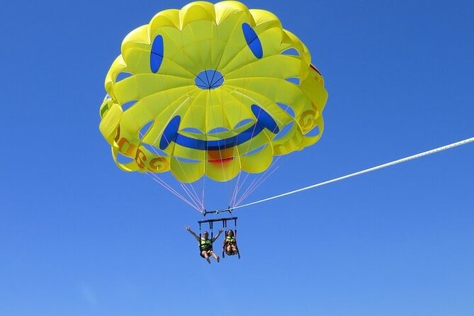 Cancun Combo Adventure: 4 Reef Snorkeling Stops & Parasailing - Parasailing Over Cancun: Flying Around 260 Feet High