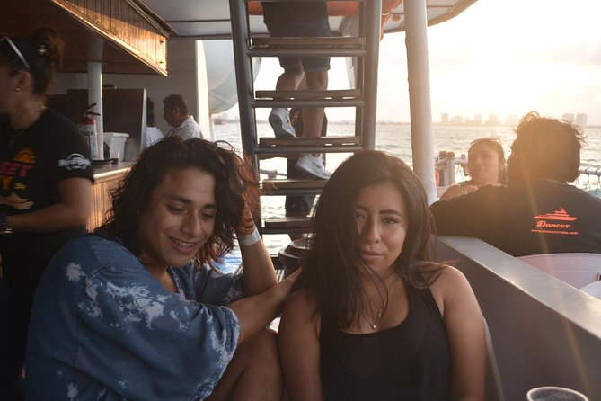 Cancun Dancer Cruise to Isla Mujeres with Snorkeling and Lunch - On-Board Fun: Salsa Lesson, Water Slide, Diving Board, and Inflatable Rings