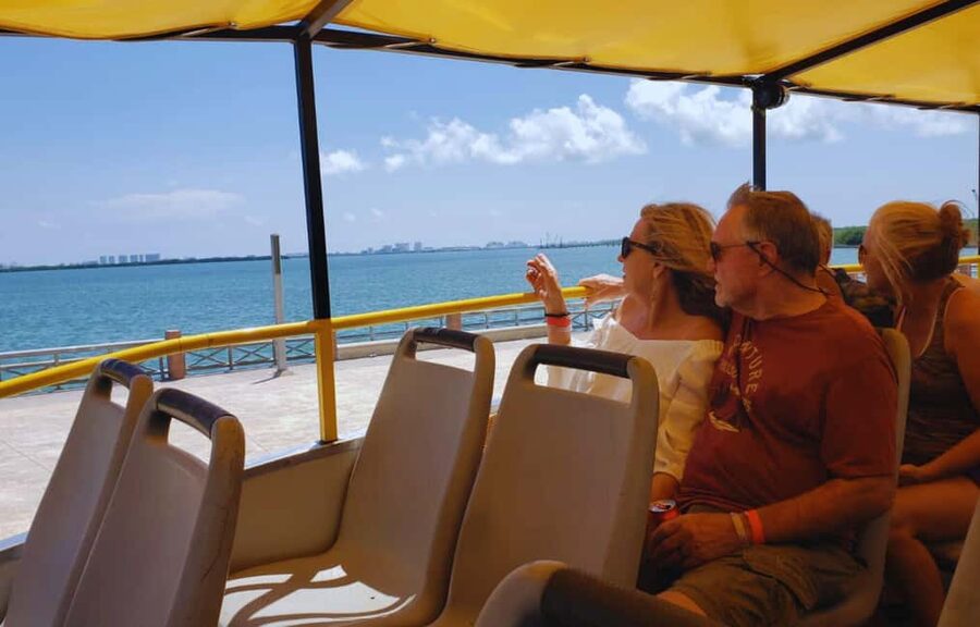Cancun: Guided City Tour with Shopping by Double Decker Bus - Downtown Cancun shopping at Plaza 28: browse with a plan