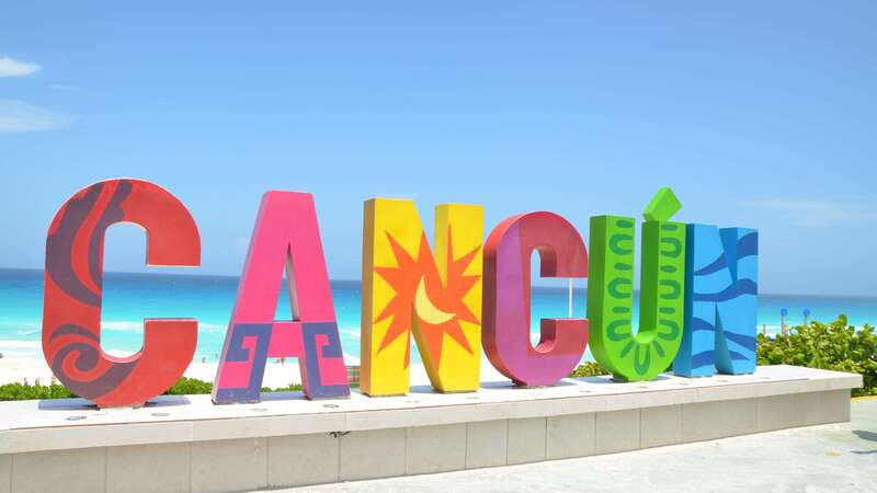 Cancun: Hop-On-Hop-Off Sightseeing Bus Tour - Hotel Zone: beaches, malls, and the Cancun sign stop