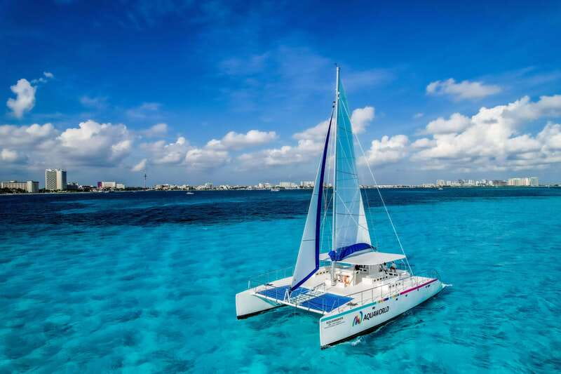 Cancun: Isla Mujeres Catamaran Tour with Open Bar of Drinks - Marina Las Perlas check-in: start on time, not stress