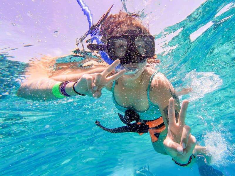 Cancun: Isla Mujeres Catamaran Tour with Open Bar of Drinks - Snorkeling in the Caribbean: what’s included, what to watch