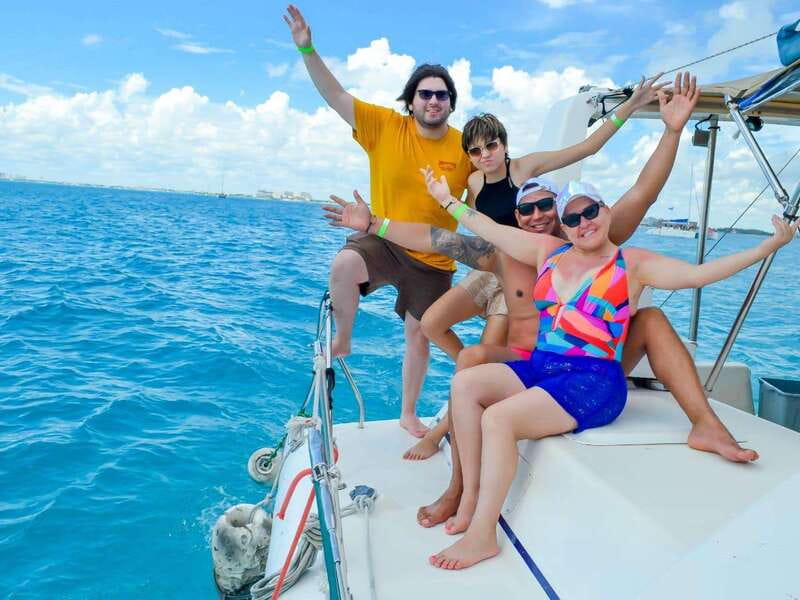 Cancun: Isla Mujeres Catamaran Tour with Open Bar of Drinks - Catamaran cruise to Isla Mujeres: sun, music, and the drink plan