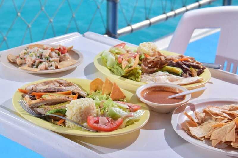 Cancun: Isla Mujeres Full Day Dancer Cruise - Lunch and the Midday Rhythm: Food That Keeps You on the Boat