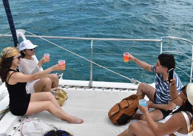 Cancun: Isla Mujeres Only Adults Catamaran, drinks & snorkel - Catamaran cruising with open bar and onboard DJ energy
