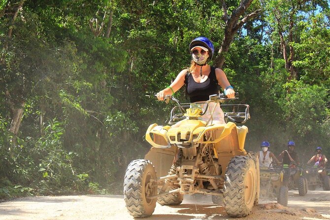Cancun Jungle Escape: ATV's + Zip Lines + Cenote + Lunch - A 6-hour jungle mix: ATVs, zip lines, bridges, and cenote