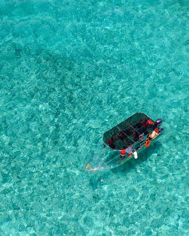 Cancún: Nichupté Lagoon Transparent Boat Tour with Drinks - Transparent-Boat Views Over Nichupté Lagoon