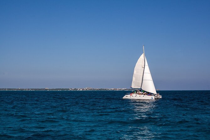Cancun Sailing Catamaran Islas Mujeres With Luxury Beach Club - Getting to the Meeting Point in Cancun: Go in With a Plan