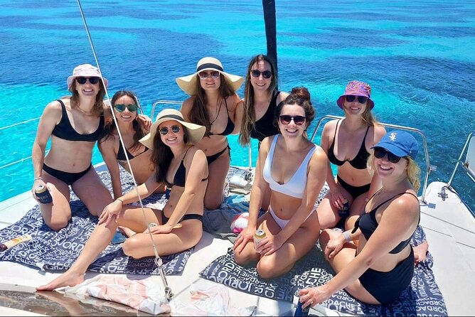 Cancun to Isla Mujeres Private Catamaran Cruising Snorkeling Fun! - Cruising to Isla Mujeres: Drinks, Music, and a Pretty Sail