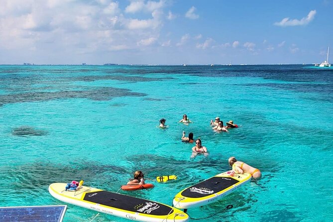 Cancun to Isla Mujeres Private Catamaran Cruising Snorkeling Fun! - Stop 4: Isla Mujeres Coast Sightseeing and the Playa Norte Swim