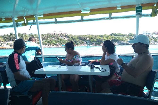 Catamaran Adventure Tour Isla Mujeres Unlimited from Cancun with Transportation - Entering the day from Cancun: pickup, meeting point, and timing