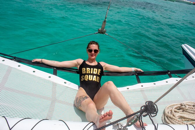 Catamaran Cancun to Isla mujeres Lunch OpenBar and Snorkeling - Lunch and DJ beats: what the onboard party stop is actually like