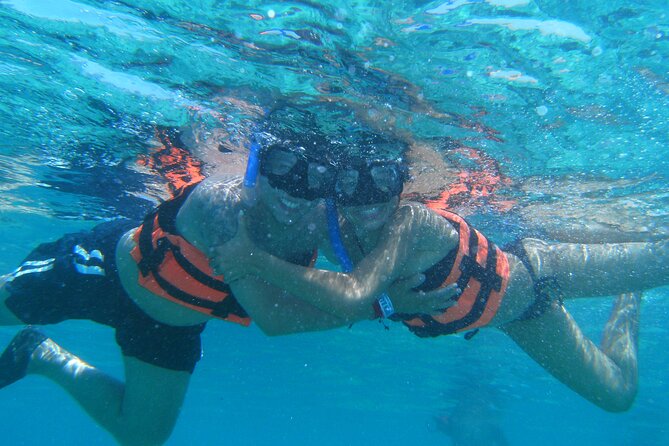 Catamaran family friendly Tour to Isla Mujeres with lunch - Isla Mujeres downtown in one hour: souvenir sprint or quick stroll