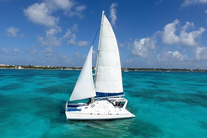 Catamaran Sailing Experience & Snorkeling Tour to Isla Mujeres - Getting There: Cancun Hotel Pickup and the Meeting Point