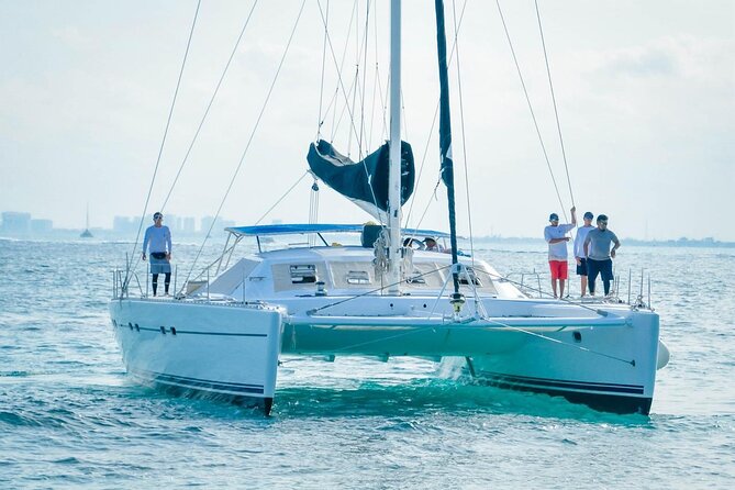 Catamaran to Isla Mujeres – Kids Go Free! (Only Pay Dock Fee) - Return to Cancún with music onboard: fun, but timing is the make-or-break