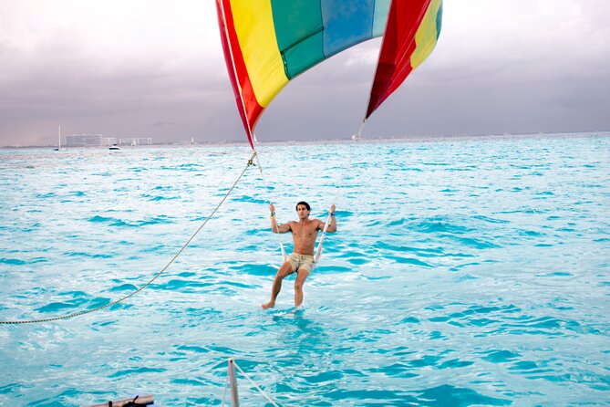 Catamaran to Isla Mujeres, Open bar, buffet, Beach Club Included - Snorkeling on the reef: fish time, and why crowding can matter
