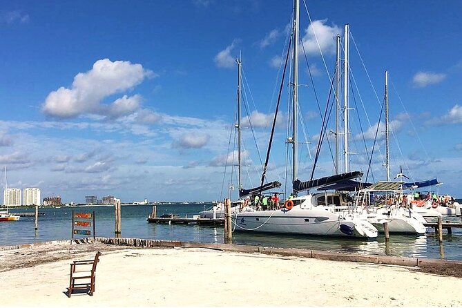 Catamaran to Isla Mujeres, Open bar, buffet, Beach Club Included - Ultramar and the 20-minute walk to Punta Norte