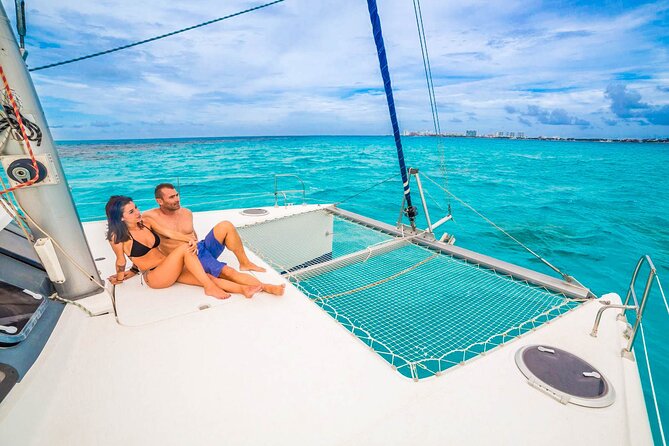 Catamaran to Isla Mujeres Snorkeling Tour with Open Bar and Lunch - Staff and service: when the crew makes or breaks it