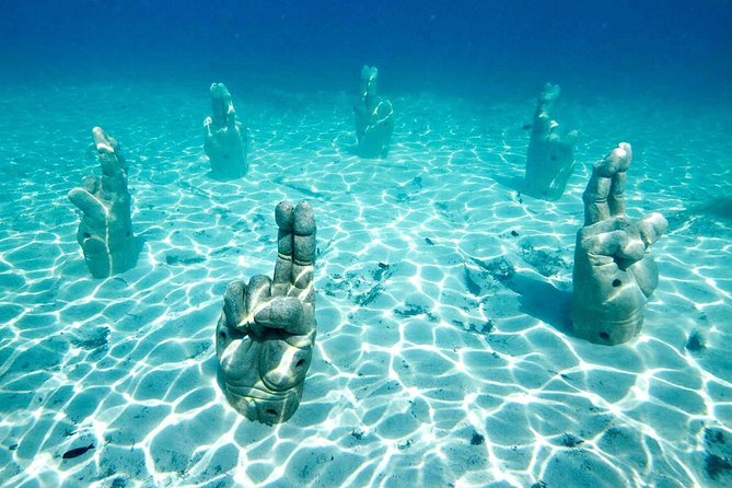 Catamaran Tour to Isla Mujeres from Cancun or Riviera Maya - The cruise and the sea activities: snorkeling plus spinnaker (when the weather cooperates)