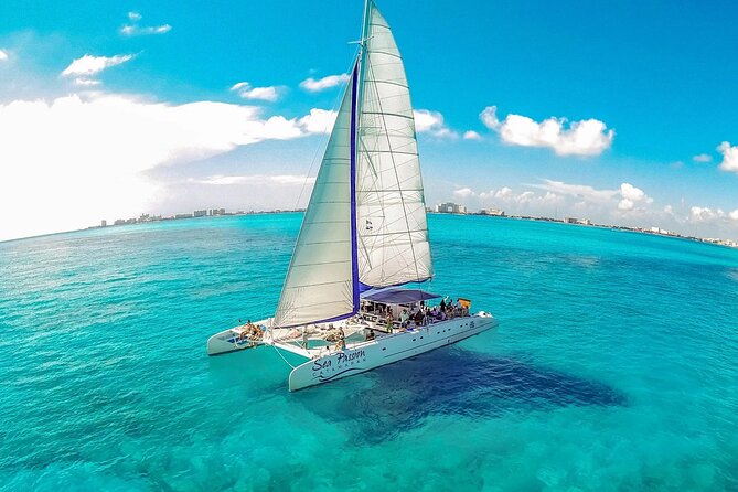 Catamaran Tour to Isla Mujeres from Cancún with Bar and Lunch - Beach Club Stop: Lunch, Seating, and a Real Place to Unwind