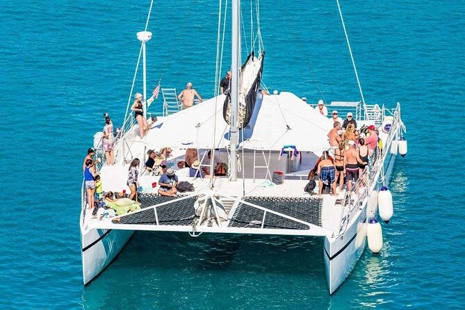 Catamaran Tour to Isla Mujeres from Cancún with Bar and Lunch - Isla Mujeres Town Time: Souvenirs Without a Forced Shopping Trap