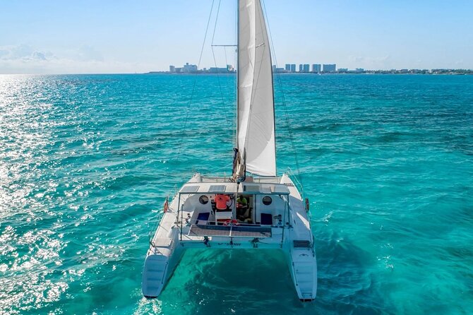 Catamaran Tour to Isla Mujeres from Cancún with Bar and Lunch - Spinnaker Time and Open Bar Energy (Yes, It’s Part of the Fun)