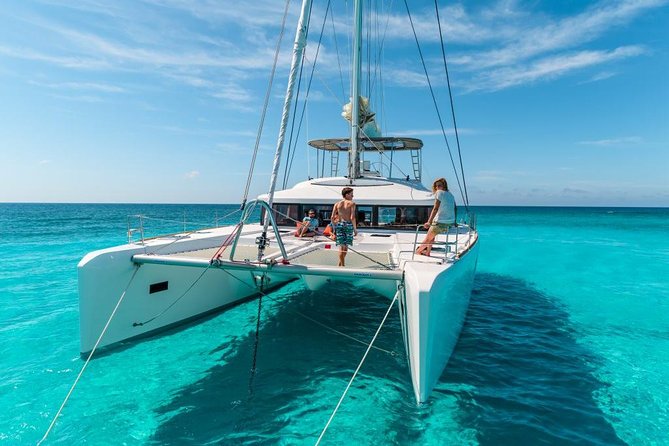 Catamaran Tour to Isla Mujeres, Open bar, Lunch, Snorkeling, Beach Club Included - Isla Mujeres Free Time: Walk the Streets, See Murals, Then Go Further