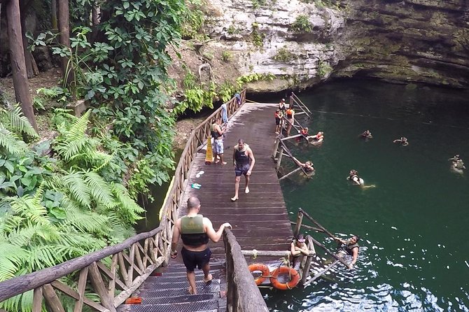 Chichen Itza Day Trip Exclusive Nool-Ha Cenote & Valladolid Visit - Cenote Nool-Ha swim: clear water, life vest, and a tight clock