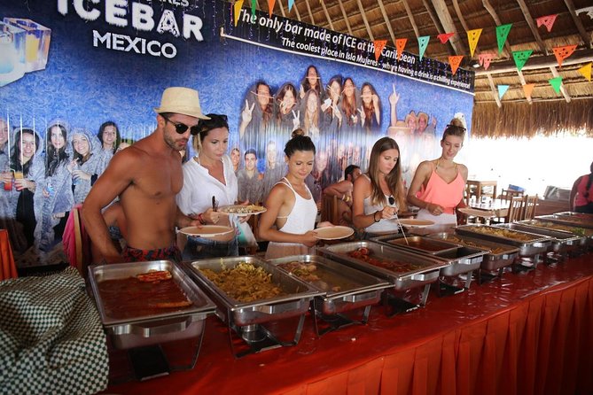 Complete Isla Mujeres excursion from Cancun with all inclusive - Stop 1: Isla Mujeres—free time, walking, and the shopping strip effect