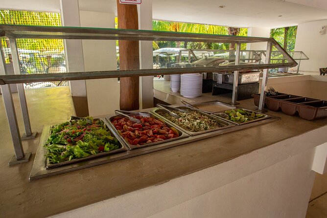 Deluxe Catamaran tour to Isla Mujeres with Open Bar and Lunch - Isla Mujeres Downtown Pier Stop: Walkable Time and Playa Norte Option