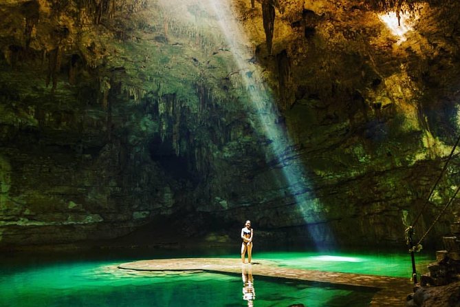 Discover ancient Mayan life at Chichen Itza Ruins and 2 cenotes - Cenote Ik Kil Swim: An Underwater Grotto With Provided Vests