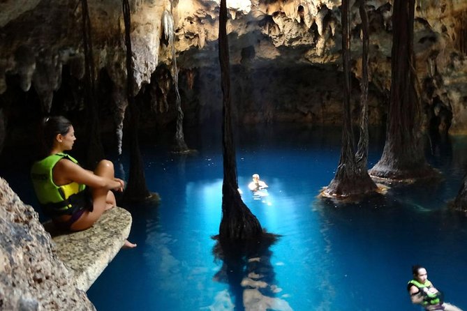 Discover and Descend on the Hidden Xenotes Tour From Cancun - Lu’um Cenote (Earth): abseiling down rock formations